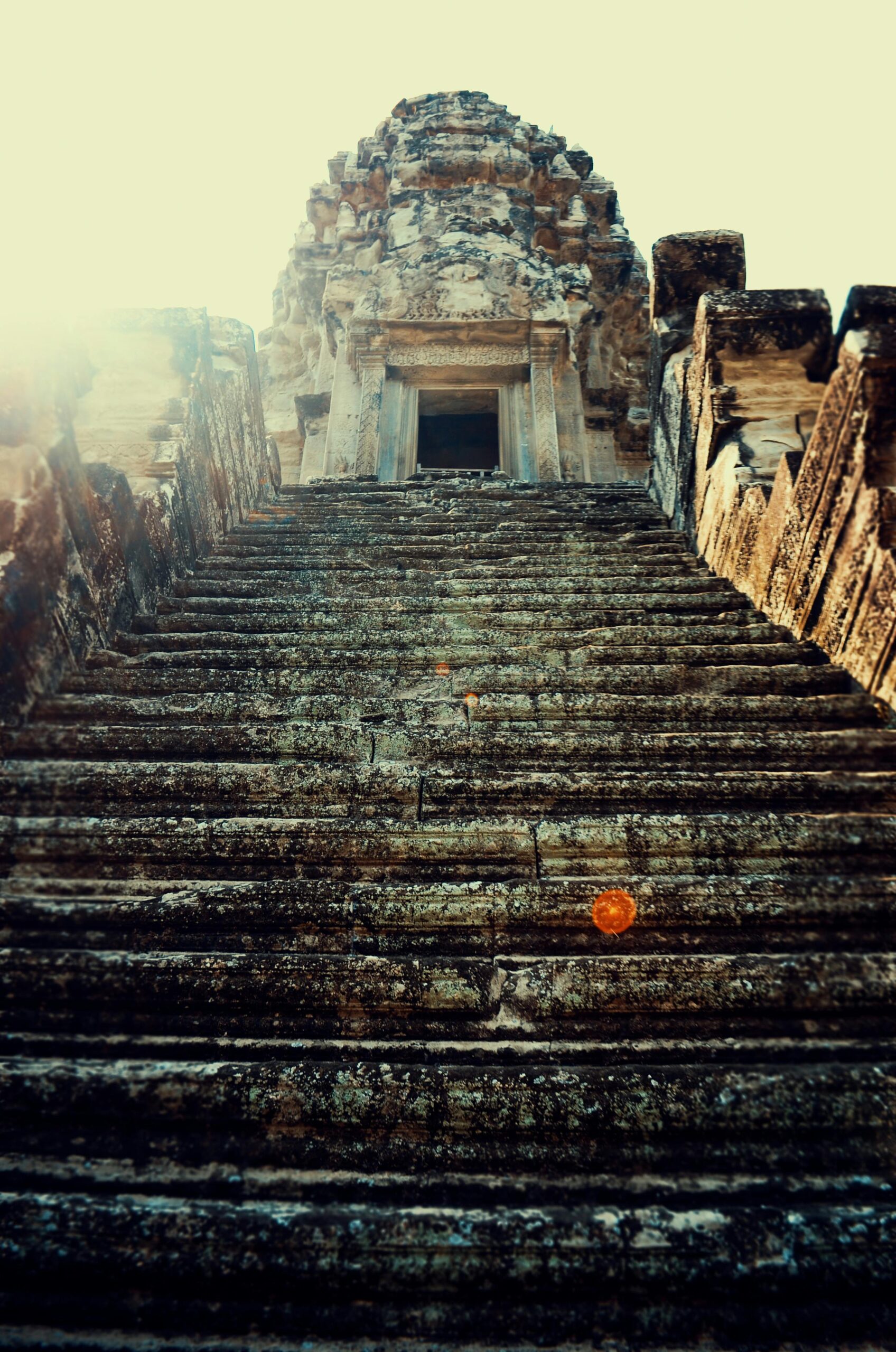 pexels-photo-965208-965208 Dramatic low angle view of ancient Angkor Wat temple stairs at daylight.